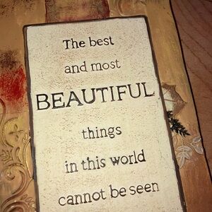 Beautiful plaque Helen Keller quote “Most beautiful things…”